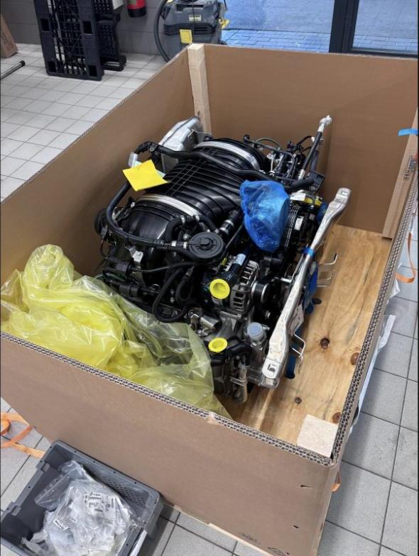 Replacement 991.1 GT3 engine arriving in a shipping crate