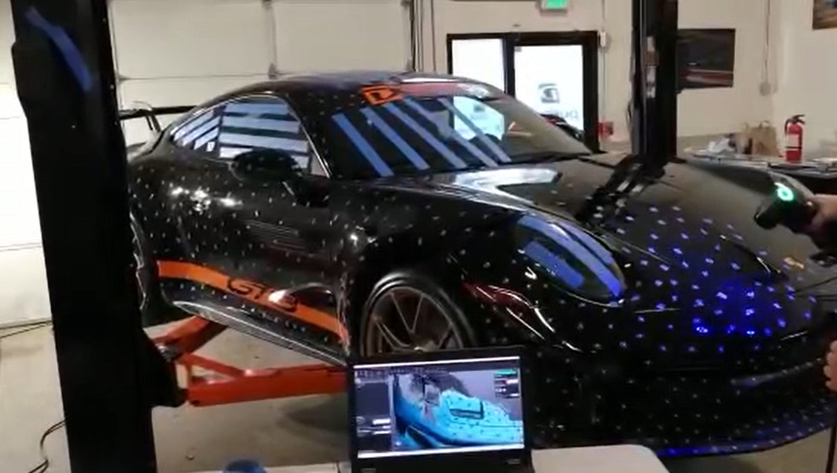 A Porsche 992 GT3 RS being 3D scanned at Dundon Motorsports
